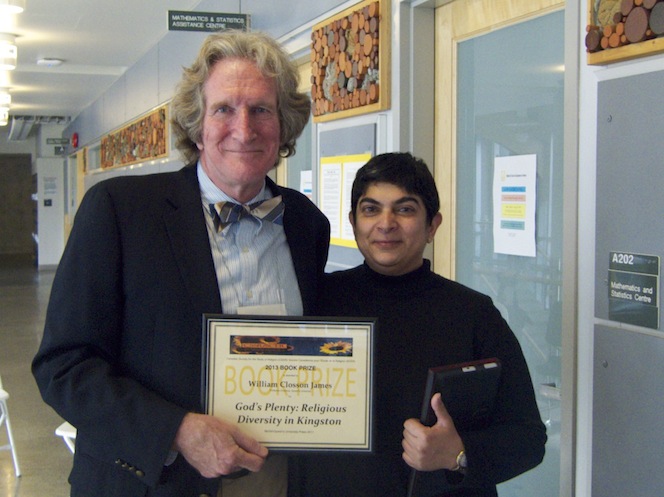 Dr. James accepting his award from current CSSR President, Dr. Ruby Ramji, at Congress in Victoria, B.C., on June 1, 2013